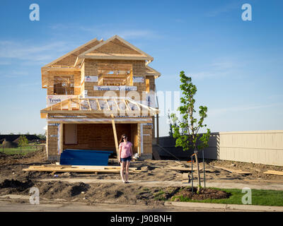 A two-storey residential house under construction in the Edmonton suburb of Beaumont, Alberta, Canada. Stock Photo