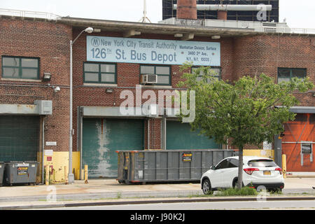 New York, New York, USA. 30th May, 2017. A view the former 126th Street Bus Depot in Upper Manhattan. Plans have recently been announced to plans to convert a former MTA bus depot on East 126th Street and First Avenue in East Harlem into affordable housing including 730 apartments and a memorial for the African Burial Ground. Construction workers discovered a 17th century slave burial ground on the location. The bus depot now closed, began as a cemetery after Peter Stuyvesant ordered African slaves to build a 9-mile road from lower Manhattan to what was then an unincorporated part of the cit Stock Photo