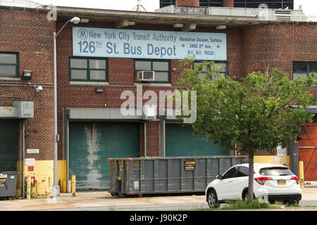 New York, New York, USA. 30th May, 2017. A view the former 126th Street Bus Depot in Upper Manhattan. Plans have recently been announced to plans to convert a former MTA bus depot on East 126th Street and First Avenue in East Harlem into affordable housing including 730 apartments and a memorial for the African Burial Ground. Construction workers discovered a 17th century slave burial ground on the location. The bus depot now closed, began as a cemetery after Peter Stuyvesant ordered African slaves to build a 9-mile road from lower Manhattan to what was then an unincorporated part of the cit Stock Photo