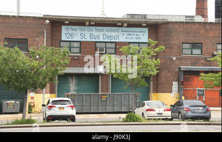 New York, New York, USA. 30th May, 2017. A view the former 126th Street Bus Depot in Upper Manhattan. Plans have recently been announced to plans to convert a former MTA bus depot on East 126th Street and First Avenue in East Harlem into affordable housing including 730 apartments and a memorial for the African Burial Ground. Construction workers discovered a 17th century slave burial ground on the location. The bus depot now closed, began as a cemetery after Peter Stuyvesant ordered African slaves to build a 9-mile road from lower Manhattan to what was then an unincorporated part of the cit Stock Photo