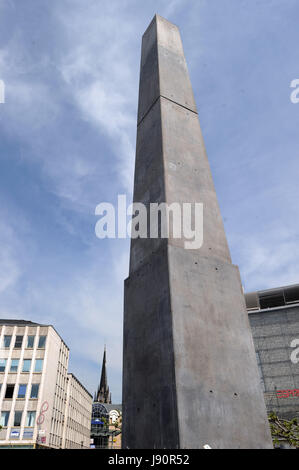 FILE - File picture dated 23 May 2017 showing the finished documenta piece, a 16-meter tall obelisk, by US artist Olu Oguibe exhibitted at the King's Square in Kassel, Germany. The documenta 14 event in Kassel runs between 10 June and 17 September 2017. Photo: Swen Pförtner/dpa Stock Photo