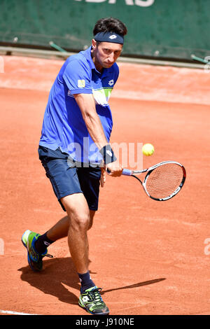 Paris, France. 31st May, 2017. Sergiy Stakhovsky of Ukraine serves to David Goffin of Belgium during the men's singles 2nd round match at the French Open Tennis Tournament 2017 in Paris, France on May 31, 2017. Credit: Chen Yichen/Xinhua/Alamy Live News Stock Photo