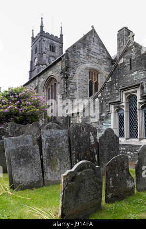 Stacked gravestones in front of St. Eustachius, the 700 year old parish church of Tavistock, Devon, UK Stock Photo