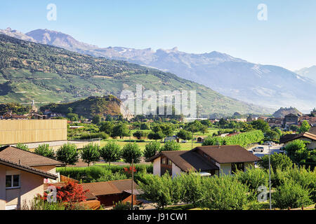 Valley and Bernese Alps mountains in Sion, Valais canton, Switzerland Stock Photo