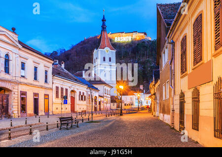 Rasnov, Romania. Medieval saxon city in Transylvania and hilltop ruins of the fortress. Stock Photo