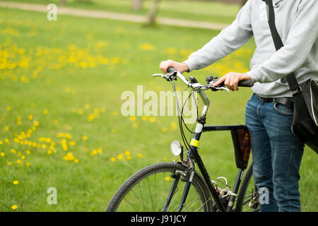 Handsome student man with retro bike Stock Photo