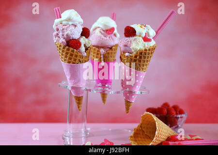 Summertime pink theme gourmet ice cream cones Stock Photo