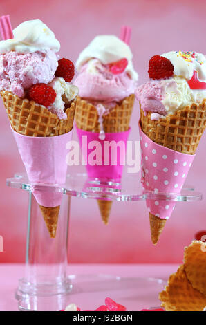Summertime pink theme gourmet ice cream cones Stock Photo