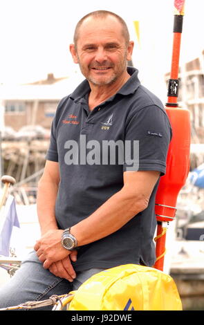 AJAXNETPHOTO. 28TH MAY, 2017. PLYMOUTH, ENGLAND. - TRANSAT - FRENCH OSTAR SKIPPER LIONEL REGNIER ONBOARD HIS YACHT ONE AND ALL IN QUEEN ANNE'S BATTERY MARINA BEFORE THE START. PHOTO:JONATHAN EASTLAND/AJAX REF:D172905 6465 Stock Photo