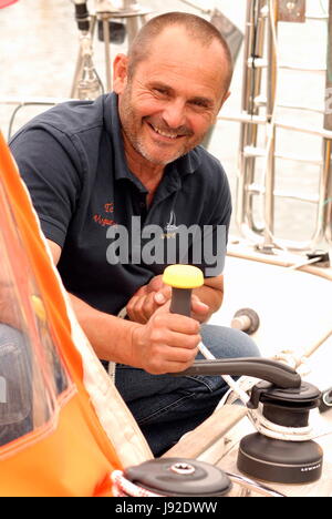 AJAXNETPHOTO. 28TH MAY, 2017. PLYMOUTH, ENGLAND. - TRANSAT - FRENCH OSTAR SKIPPER LIONEL REGNIER ONBOARD HIS YACHT ONE AND ALL IN QUEEN ANNE'S BATTERY MARINA BEFORE THE START. PHOTO:JONATHAN EASTLAND/AJAX REF:D172905 6466 Stock Photo