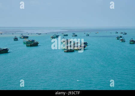 fishermen and wooden boats in sea view from Pamban Bridge, Rameshwaram Stock Photo