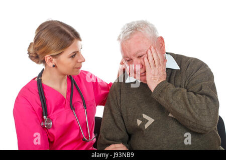 Picture of an old man having a serious migraine - isolated background Stock Photo