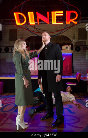 London, UK. 30 May 2017. Pictured: Lucy McCormick, David Thaxton. Soho Theatre presents the UK Premiere of the 2015 Verity Bargate award-winning musical comedy Roller Diner, Home of the Full English Brexit, written by Stephen Jackson and directed by Soho Theatre's artistic director Steve Marmion. Cast: Lucy McCormick (Marika Malinsky), Joe Dixon (Eddie), David Thaxton (Roger), Rina Fatania (Jean), Lucie Shorthouse (Chantal) and Ricky Oakley (PJ). Performances run from 26 May to 24 June 2017. Stock Photo