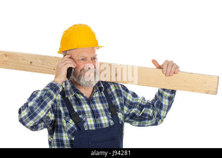 Picture of a happy engineer talking on the phone Stock Photo