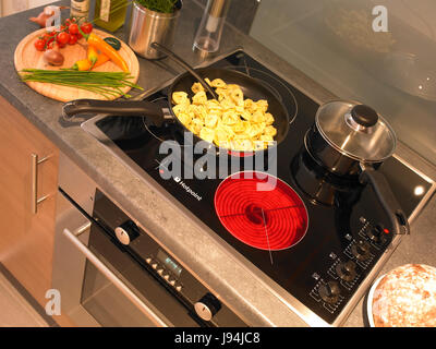 Cooker and oven hob in kitchen Stock Photo