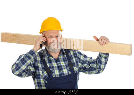 Picture of a happy engineer talking on the phone Stock Photo