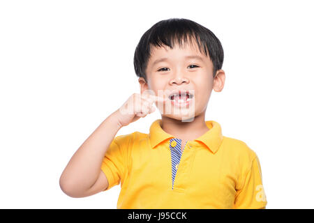 Lost milk tooth asian boy, Close up view. Stock Photo