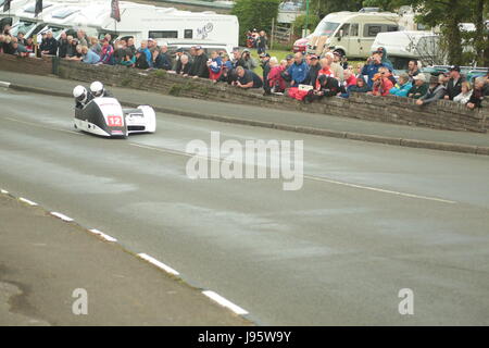 Ramsey, UK. 5th Jun, 2017. Isle of Man TT Races, Sure Sidecar Race. Wayne Lockey and Mark Sayers on their 600cc Ireson Honda of the Real Racing team at Cruickshanks Corner, Ramsey, Isle of Man. Credit: Louisa Jane Bawden/Alamy Live News. Stock Photo