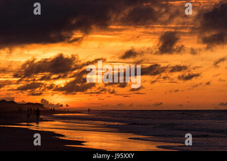 South Carolina, USA. 5th Jun, 2017. Dawn breaks on a cloudy morning June 5, 2017 in Folly Beach, South Carolina. Folly Beach is a quirky beach community outside Charleston known to locals as the Edge of America. Credit: Planetpix/Alamy Live News