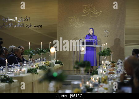 Auvers Sur Oise, France 03/06/2017 -  The Iranian Resistance’s President elect Maryam Rajavi urged all Muslims to unite over rejection of compulsory religion and stand up to the Velayat-e Faqih regime ruling Iran as the common enemy of all nations in the region She speaks in an Iftar gathering on the occasion of Ramadan, held at the central office of the National Council of Resistance of Iran in Auvers-sur-Oise, north of Paris on June 3, 2017. Stock Photo