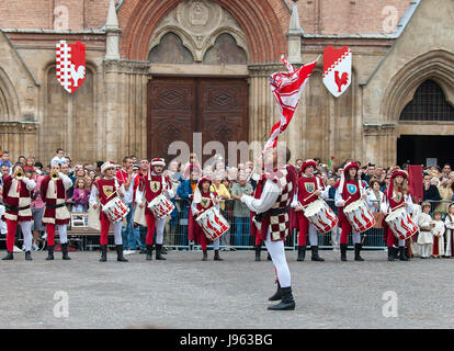 Bugler in medieval reenactment costumes Stock Photo - Alamy