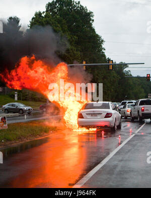 Car fire in street - USA Stock Photo