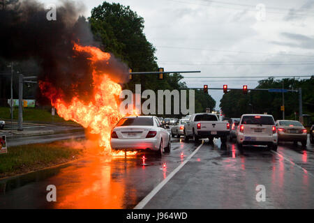 Car fire in street - USA Stock Photo