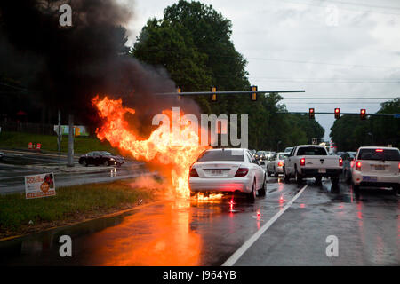 Car fire in street - USA Stock Photo