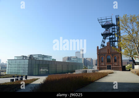 Old mine shaft and modern buildings (Silesian Museum, Katowice in Poland) Stock Photo