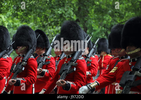 Members of the Household Division march down Birdcage Walk, central London, during rehearsals for Trooping the Colour on 31 May 2017. Stock Photo