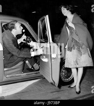 1960 Motorshow. Standard Vanguard with actor Bernard Bresslaw Stock Photo