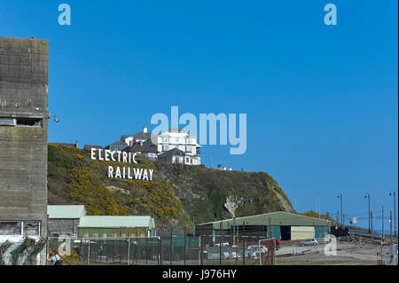 Remains of Summerland in Douglas Isle of Man with Electric Railway sign on headland Stock Photo
