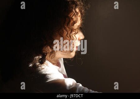 Portrait of beautiful little girl with curly hair Stock Photo