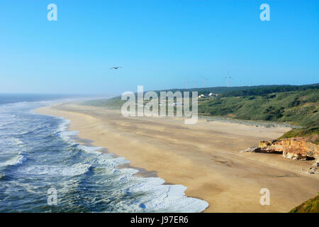 Praia do Norte beach in front of the Atlantic Ocean. Nazare, Portugal Stock Photo