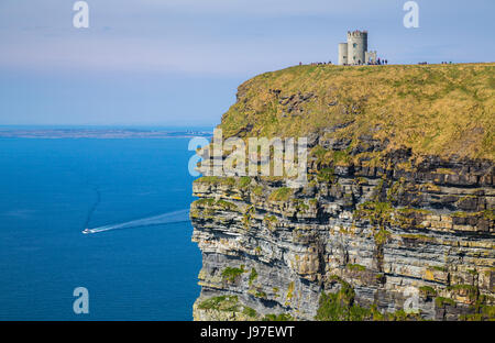 The Cliffs of Moher are located at the southwestern edge of the Burren region in County Clare, Ireland. Stock Photo