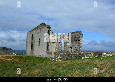ruins of old Kilmuir church overlooking Camas Mor Bay well known landmark Kilmuir Isle of Skye Scotland UK Stock Photo