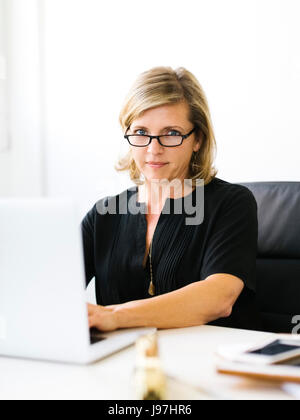 Portrait of Mature woman in eyeglasses Stock Photo