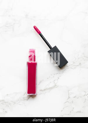 Lip gloss on marble background Stock Photo