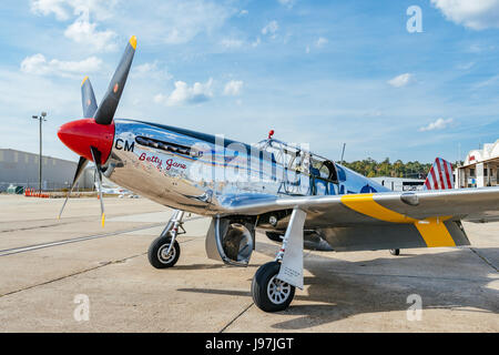 Parked vintage American P 51 Mustang fighter airplane, the Betty Jane, from WWII era. Stock Photo
