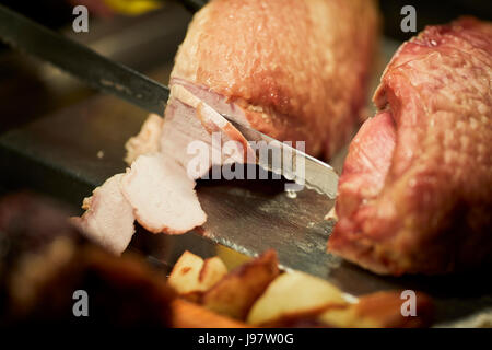 Carvery pub, turkey being sliced at the counter. Stock Photo