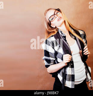 young happy smiling hipster blond girl with backpack ready to sc Stock Photo