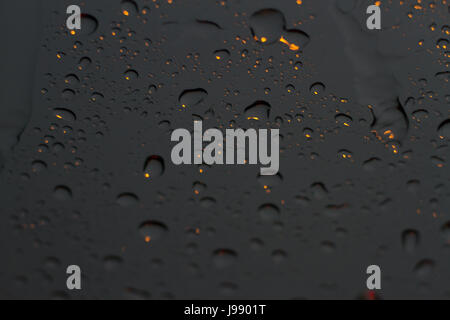 raindrops on car glass in the raining day, rain stain Stock Photo