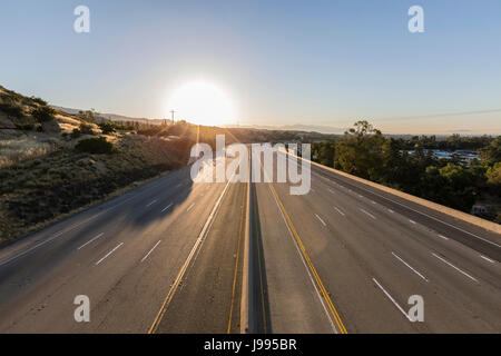Empty ten lane route 118 freeway at sunrise in the San Fernando Valley area of Los Angeles, California. Stock Photo