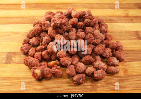 Sweet peanut made with sugar and chocolate. Peanut made in Brazil. Stock Photo