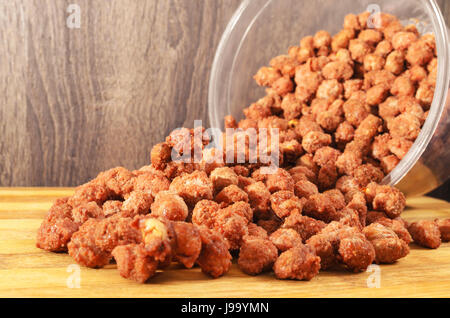 Sweet peanut made with sugar and chocolate. Peanut made in Brazil. Stock Photo