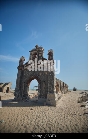 Remnants of the old Dhanushkodi church. Dhanushkodi was destroyed in a devastating cyclone in the year 1964 and popularly known as Ghost city. Stock Photo