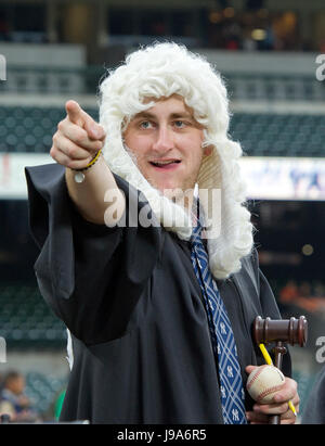 Alek Bernold of Utica, New York, wearing a traditional judge's wig and robe,  cheers for New York Yankees right fielder Aaron Judge (99) prior to the  game against the Baltimore Orioles at