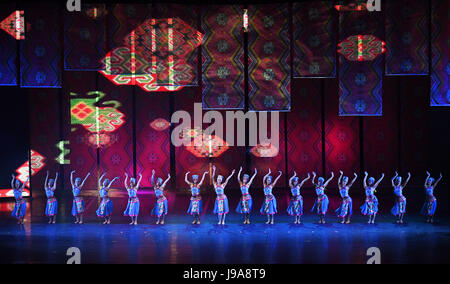 Chongqing, China's Chongqing Municipality. 31st May, 2017. A song and dance performance featuring tales about the Tujia ethnic group is staged at the Huangshui Grand Theater in Huangshui Town of Shizhu Tujia Autonomous County, southwest China's Chongqing Municipality, May 31, 2017. Credit: Wang Quanchao/Xinhua/Alamy Live News Stock Photo