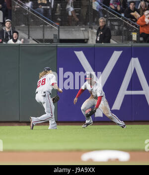 San Francisco, California, USA. 31st May, 2017. Neither Washington Nationals left fielder Jayson Werth (28) nor Washington Nationals center fielder Michael Taylor (3) could make it to catch San Francisco Giants catcher Buster Posey (28) pop fly to center field during a MLB baseball game between the Washington Nationals and the San Francisco Giants on Japanese Heritage Night at AT&T Park in San Francisco, California. Valerie Shoaps/CSM/Alamy Live News Stock Photo