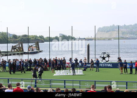 Cardiff Bay, Wales, UK. 1st June 2017. Ian Rush poses alongside the Champions League Trophy on the temporary floating football pitch outside the National Assembly for Wales. Cardiff Bay, Wales, UK Credit: Elizabeth Foster/Alamy Live News Stock Photo